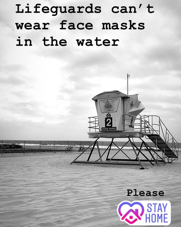 Please stay home as lifeguards can't wear masks in the water with image of beach tower.
